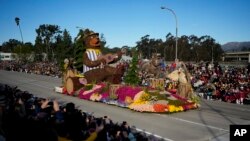 The Western Asset float rolls down the parade route at the 135th Rose Parade in Pasadena, Calif., Jan. 1, 2024.