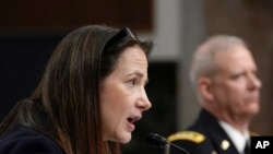 Avril Haines, director of national intelligence, and Lieutenant General Scott Berrier, director of the Defense Intelligence Agency, testify during a Senate Armed Services Committee hearing on worldwide threats, May 4, 2023, on Capitol Hill in Washington.