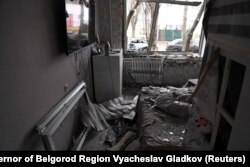 A view shows a damaged apartment following an incident which local authorities said was a Ukrainian missile attack in Belgorod, Russia, March 16, 2024. (Telegram channel of Governor of Belgorod Region Vyacheslav Gladkov/Handout via Reuters)