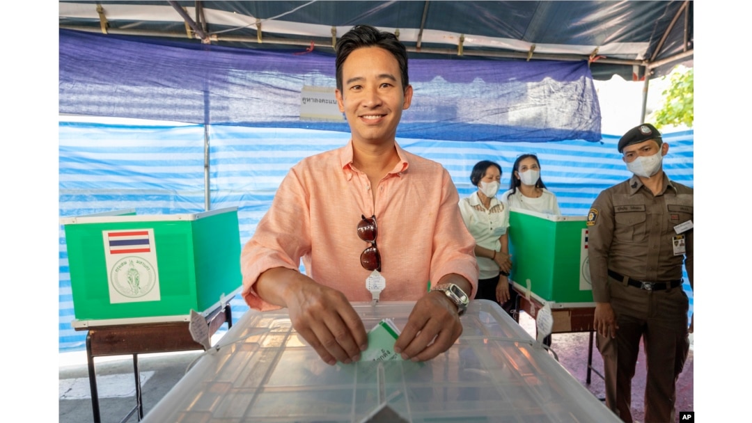 Leader of Move Forward Party Pita Limjaroenrat poses as he casts his vote during a general election at a polling station in Bangkok, Thailand, May 14, 2023.