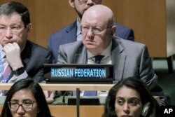 FILE - Russia's U.N. Ambassador Vassily Nebenzia listens before a U.N. General Assembly vote at U.N. headquarters in New York City, Feb. 23, 2023.