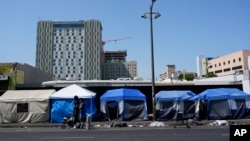 Tents are lined up on Skid Row in Los Angeles, July 25, 2024. California Gov. Gavin Newsom issued an executive order Thursday to direct state agencies on how to remove homeless encampments.