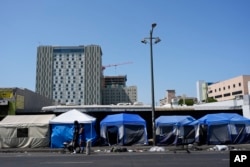 Tents are lined up on Skid Row in Los Angeles, July 25, 2024.