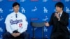 Bintang bisbol klub Los Angeles Dodgers Shohei Ohtani (kiri) bersama penerjemahnya, Ippei Mizuhara (foto: dok). 