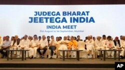 FILE- Leaders from the opposition INDIA alliance sit for a press briefing in Mumbai, India, Sept. 1, 2023. The opposition has united under a front called INDIA.