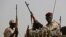 Sudanese soldiers from the Rapid Support Forces unit, led by Gen. Mohammed Hamdan Dagalo, the deputy head of the military council, secure the area where Dagalo attends a military-backed tribe's rally, in the East Nile province, Sudan. (Hussein Malla/AP Photo)
