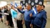 FILE - Recently released political prisoners from Nicaragua stand during a news conference at the office of Miami-Dade County Mayor in Miami, Feb. 15, 2023. Nicaraguan President Daniel Ortega recently sent 222 political prisoners to the United States. 