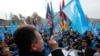 FILE - Dolkun Isa, president of the World Uyghur Congress, gestures as he speaks during a demonstration against China, in Geneva, Switzerland, Nov. 6, 2018. The World Uyghur Congress has been nominated for the 2023 Nobel Peace Prize. 