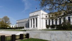 La estabilidad financiera nacional dio paso al aumento de tasas, afirman representantes de la Fed.