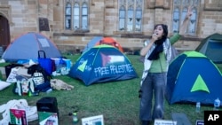 FILE - A pro-Palestinian protester demonstrates at the University of Sydney to protest the Israel Hamas war, April 24, 2024.