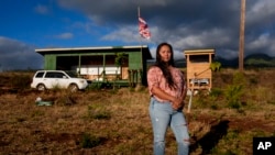 Jordan Ruidas, a Lahaina Strong organizer, stands for a photo in an area of state land she is working to help re-green with Kaiaulu Initiatives, July 5, 2024, near Lahaina, Hawaii.