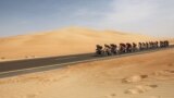 The peloton rides during the first stage of the UAE cycling tour from al-Dhafra Castle to Qassar al-Mighayra St in al-Mirfa in the emirate of Abu Dhabi. UAE, Feb. 20, 2023. 