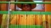 Marcelina Choque weaves on her loom at home in Pozo Almonte, Chile, on July 30, 2023. “I taught my daughters how to weave just like me, but now that they have other jobs, they don’t weave anymore,” Choque said.