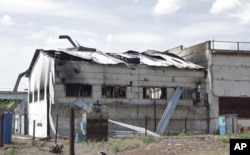 FILE - This image from video shows the damaged barracks at the Russian-controlled Olenivka prison in Olenivka, eastern Ukraine, on July 29, 2022.