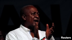 FILE - John Mahama, Ghana's president and National Democratic Congress (NDC) presidential candidate sings during his rally at Accra sport stadium, in Accra, Ghana December 5, 2016.