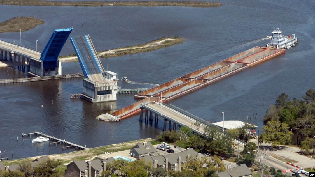 FILE - The Popp's Ferry Bridge in Biloxi, Mississippi, is seen on March 20, 2009 after it was hit and damaged by a barge trying to navigate through the drawbridge. 