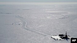 FILE - This 2019 aerial photo provided by ConocoPhillips shows an exploratory drilling camp at the proposed site of the Willow oil project on Alaska's North Slope. 