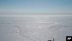FILE - This 2019 aerial photo provided by ConocoPhillips shows an exploratory drilling camp at the proposed site of the Willow oil project on Alaska's North Slope. 