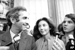 FILE - Daniel Ellsberg, co-defendant in the Pentagon Papers trial, talks to reporters after he testified in Los Angeles, April 12, 1973.