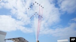 Jets of the Patrouille de France fly over the international ceremony at Omaha Beach in Normandy near Saint-Laurent-sur-Mer.&nbsp;Normandy is hosting various events to officially commemorate the 80th anniversary of the D-Day landings that took place on June 6, 1944.&nbsp;