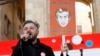 FILE - Nika Gvaramia, chief executive officer of Rustavi 2, speaks during a rally to support opposition TV channel Rustavi 2 in Tbilisi, Georgia, Feb. 19, 2017. 