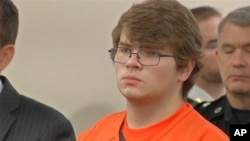 Payton Gendron listens as he is sentenced on Feb. 15, 2023 in Buffalo, N.Y. Gendron, a white supremacist who killed 10 Black people at a Buffalo supermarket, was sentenced to life in prison.