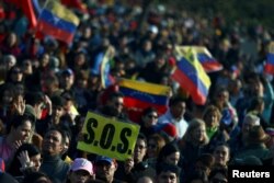 People march in support of Venezuela's opposition coalition that continues to push for recognition of what it says is its resounding victory in last month's presidential election in Buenos Aires, Argentina, Aug. 17, 2024.