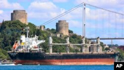 FILE - The cargo ship Mikhail Nenashev sails past Istanbul, Turkey, July 4, 2022. An Associated Press investigation shows the ship, owned by a sanctioned Russian state-owned defense contractor, has been hauling stolen Ukrainian grain from Crimea to customers in the Middle East.