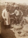 This circa 1884-1886 photo by Army surgeon/naturalist Edgar Alexander Mearns shows two unidentified men, possibly Mearns himself on right, excavating pre-Columbian ruins in central Arizona's Verde River Valley.
