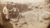 This circa 1884-1886 photo by Army surgeon/naturalist Edgar Alexander Mearns shows two unidentified men, possibly Mearns himself on right, excavating pre-Columbian ruins in central Arizona's Verde River Valley.
