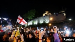 Demonstrators hold a rally to protest against a bill on 'foreign agents' in Tbilisi, Georgia, May 11, 2024. 