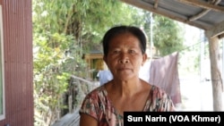 The photo was taken on March 18, 2024. Sok Srey, 60, is a villager in Kean Svay District, Kandal Province. She faces eviction due to the proposed canal.