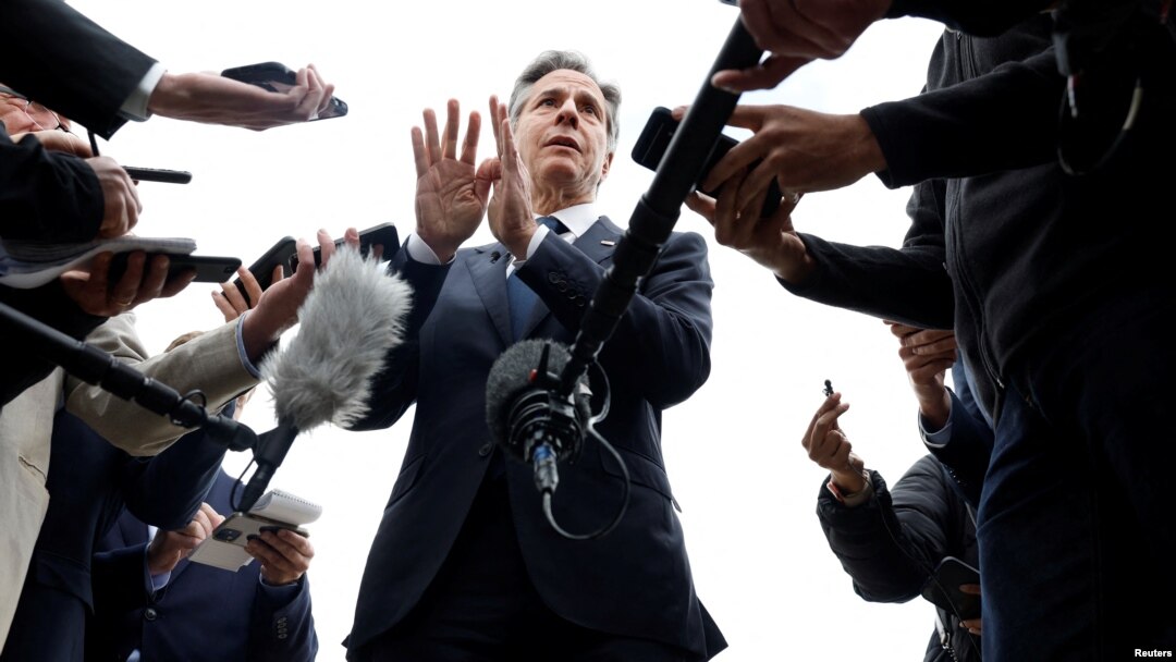 U.S. Secretary of State Antony Blinken speaks to members of the media before boarding his plane to return to Washington, following his week-long trip aimed at calming tensions across the Middle East, in Cairo, Egypt, Jan. 11, 2024. 
