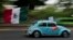 An antique Volkswagen Beetle, known in Mexico as a "vocho," parades through the streets a day after World Vocho Day, in Mexico City, June 23, 2024.
