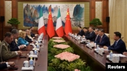 Chinese President Xi Jinping and his delegation attends a meeting with Italian Premier Giorgia Meloni at the Diaoyutai State Guesthouse in Beijing, July 29, 2024. 