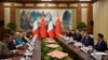 Presiden China Xi Jinping dan delegasinya menghadiri pertemuan dengan Perdana Menteri Italia Giorgia Meloni di Wisma Negara Diaoyutai di Beijing, China, Senin, 29 Juli 2024. (Vincent Thian/Pool via REUTERS)