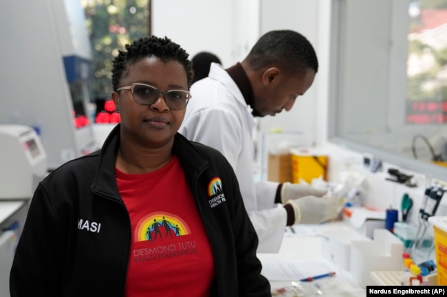 Thandeka Nkosi, coordinator of the clinical tests, is in the laboratory at the Desmond Tutu Health Foundation's Masiphumelele Research Site, in Cape Town, South Africa, July 23, 2024. (AP Photo/Nardus Engelbrecht)