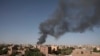 FILE - Smoke is seen in Khartoum, Sudan, April 19, 2023. The U.S. conducted its first organized evacuation of citizens and permanent residents from Sudan on April 29, said the U.S. State Department.