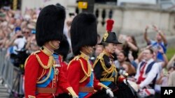 Prince William, left, Prince Edward, center, and Princess Anne leave Buckingham Palace to take part in the Trooping The Color parade, in London, June 17, 2023.