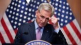 Representative Kevin McCarthy speaks to reporters hours after he was ousted as Speaker of the House at the Capitol in Washington, Oct. 3, 2023.