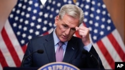 Representative Kevin McCarthy speaks to reporters hours after he was ousted as Speaker of the House at the Capitol in Washington, Oct. 3, 2023.