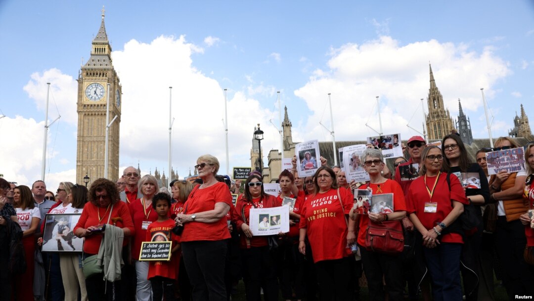 People impacted by the contaminated blood scandal gather in Westminster for a vigil to remember those that lost their lives, ahead of the release of final report of the Infected Blood Inquiry on Monday, London, May 19, 2024.