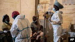 FILE - Health workers treat cholera patients at the Bwaila Hospital in Lilongwe, Malawi, Jan. 11, 2023.