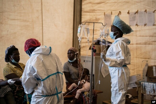 FILE - Health workers treat cholera patients at the Bwaila Hospital in Lilongwe, Malawi, Jan. 11, 2023.
