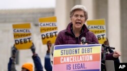 Sen. Elizabeth Warren speaks at a rally for student debt relief advocates gather outside the Supreme Court on Capitol Hill in Washington, Feb. 28, 2023, as the court hears arguments over President Joe Biden's student debt relief plan. 