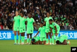 FILE - Nigeria's players react during a penalty shootout during the Women's World Cup round of 16 soccer match between England and Nigeria in Brisbane, Australia, Aug. 7, 2023. (AP Photo/Tertius Pickard)