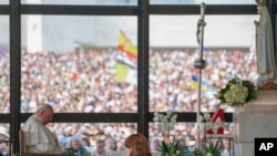 Pope Francis prays in front of the statue of Mary at the Catholic holy shrine of Fatima, Portugal, on Aug. 5, 2023.