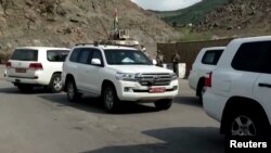 In a screengrab from video, United Nations mission vehicles arrive in Nagorno-Karabakh, Oct. 1, 2023, in Lachin, Azerbaijan.