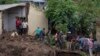 Malawi Defence Force soldiers work with community members to recover bodies of victims of landslides after heavy rains from Cyclone Freddy in Blantyre, Malawi, March 16, 2023. 