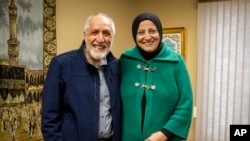 Bibi Bahrami is pictured with her husband, Dr. Mohammad Saber Bahrami, at the Islamic Center of Muncie, March 3, 2023, in Muncie, Ind., where she is one of the mosque's leaders. 